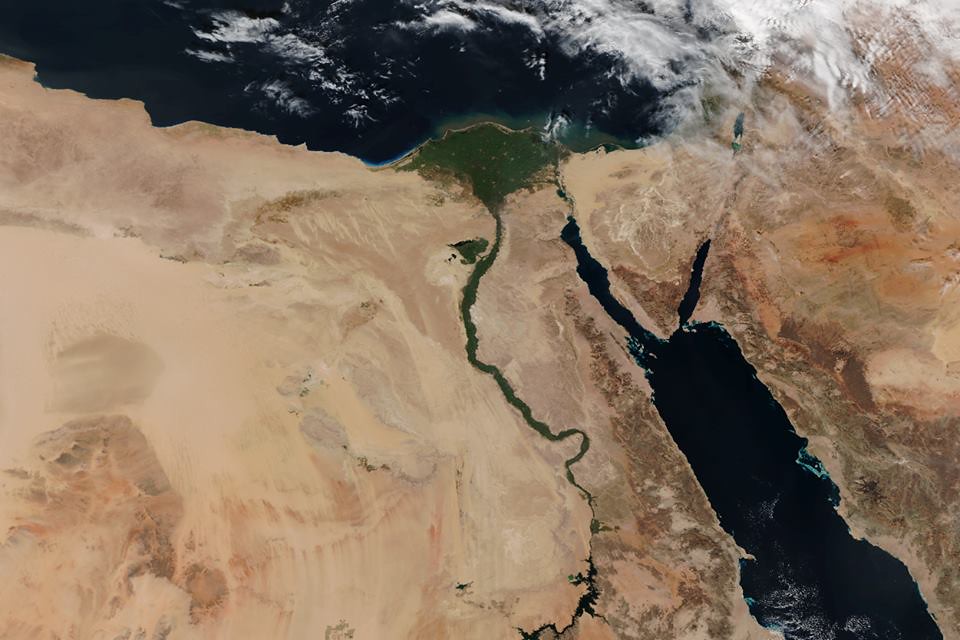 Satellite image with true color reveals the greenness of the Nile River against the tawny sands of the Sahara.