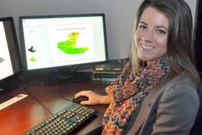 woman at a work desk working