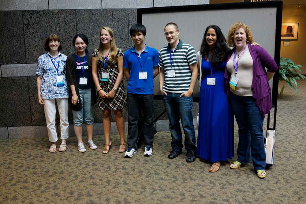 a group of people standing side by side