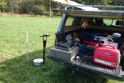 bunch of equipment out of the back of a car