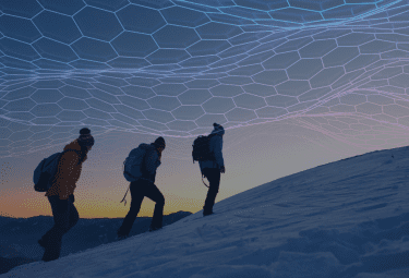 Three people hike over a snowy ridge at sunrise with a hexagonal topographic data overlay.