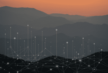 Sunset over mountains near Asheville, NC with a transparent overlay of data nodes